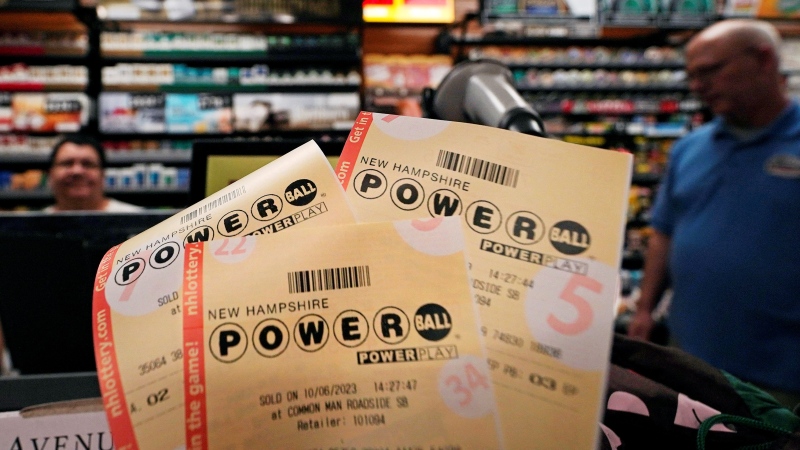 Powerball lottery tickets are displayed at the New Hampshire General Store along Route 93 South, Friday, Oct. 6, 2023, in Hooksett, N.H.  (AP Photo/Charles Krupa)